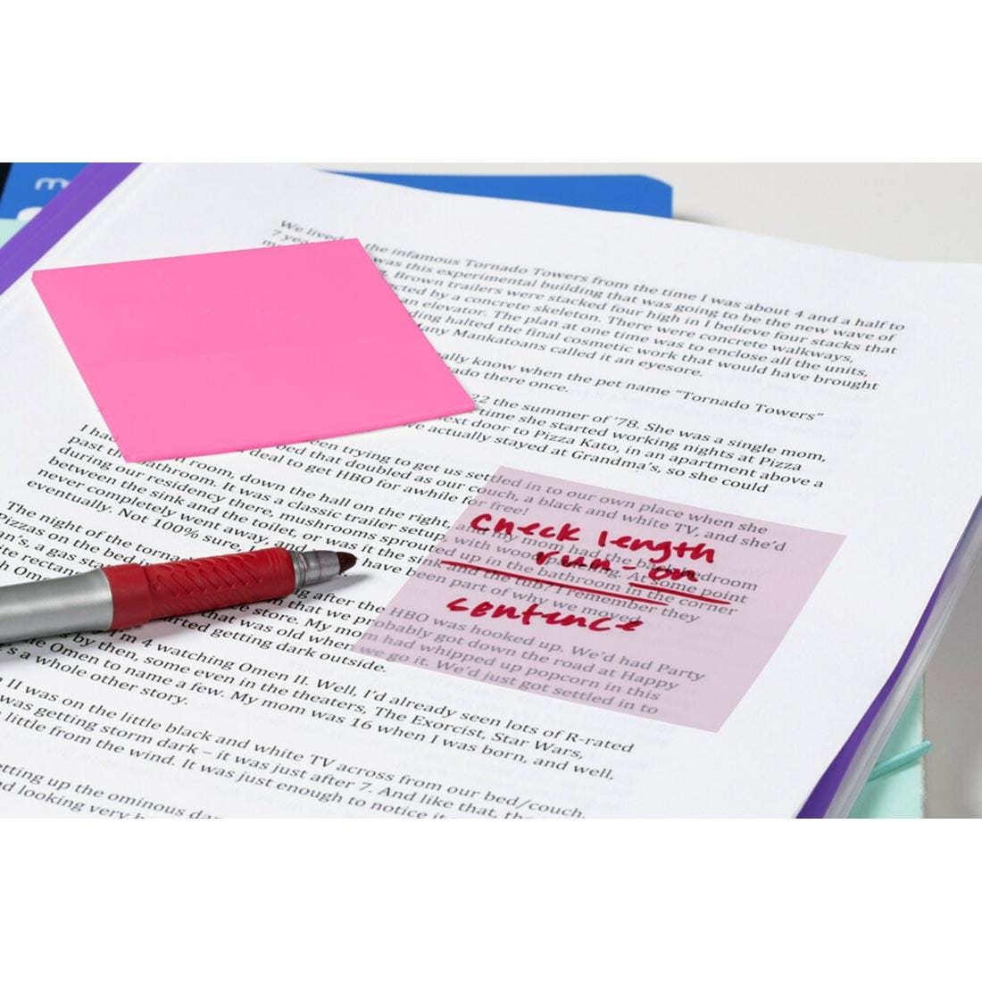 a Colored Transparent Post-It Note shown with a red marker on white paper