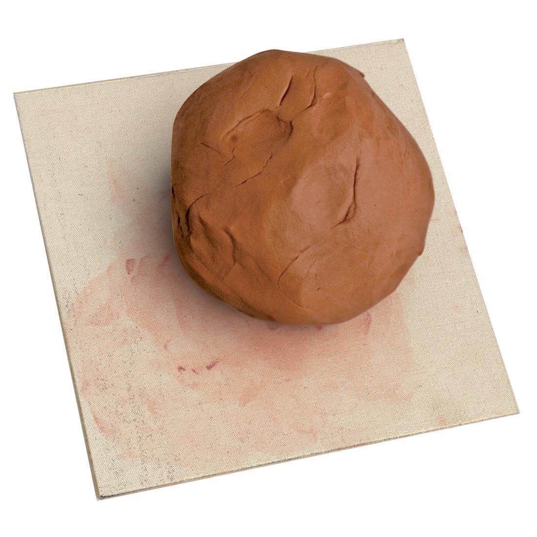 AMACO Canvas Covered Board shown with a ball of clay on top