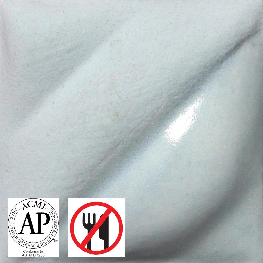 tile chip with Iceberg Blue AMACO Velvet Underglaze applied; symbols for AP Seal and not food safe