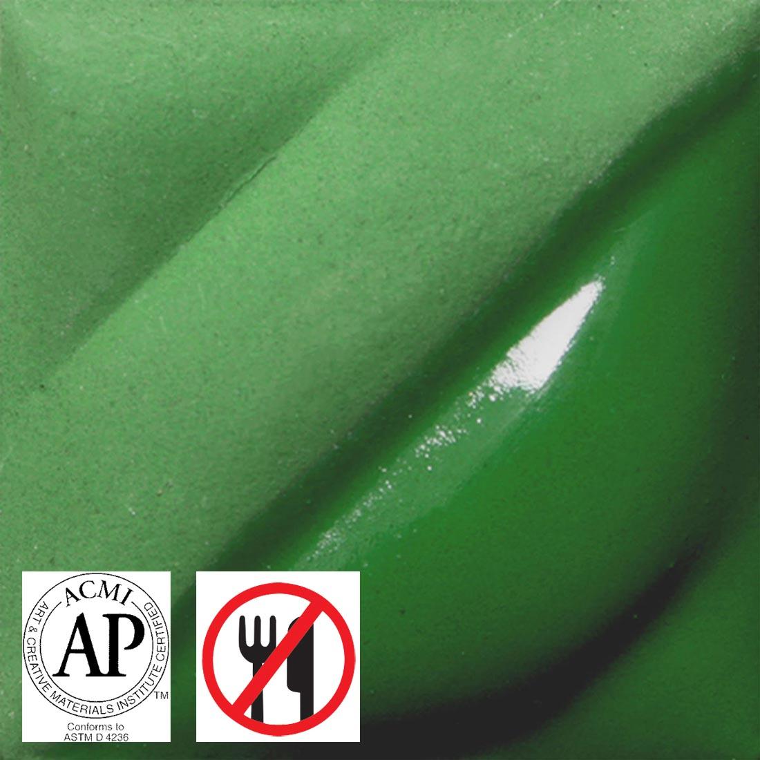 tile chip with Dark Green AMACO Velvet Underglaze applied; symbols for AP Seal and not food safe