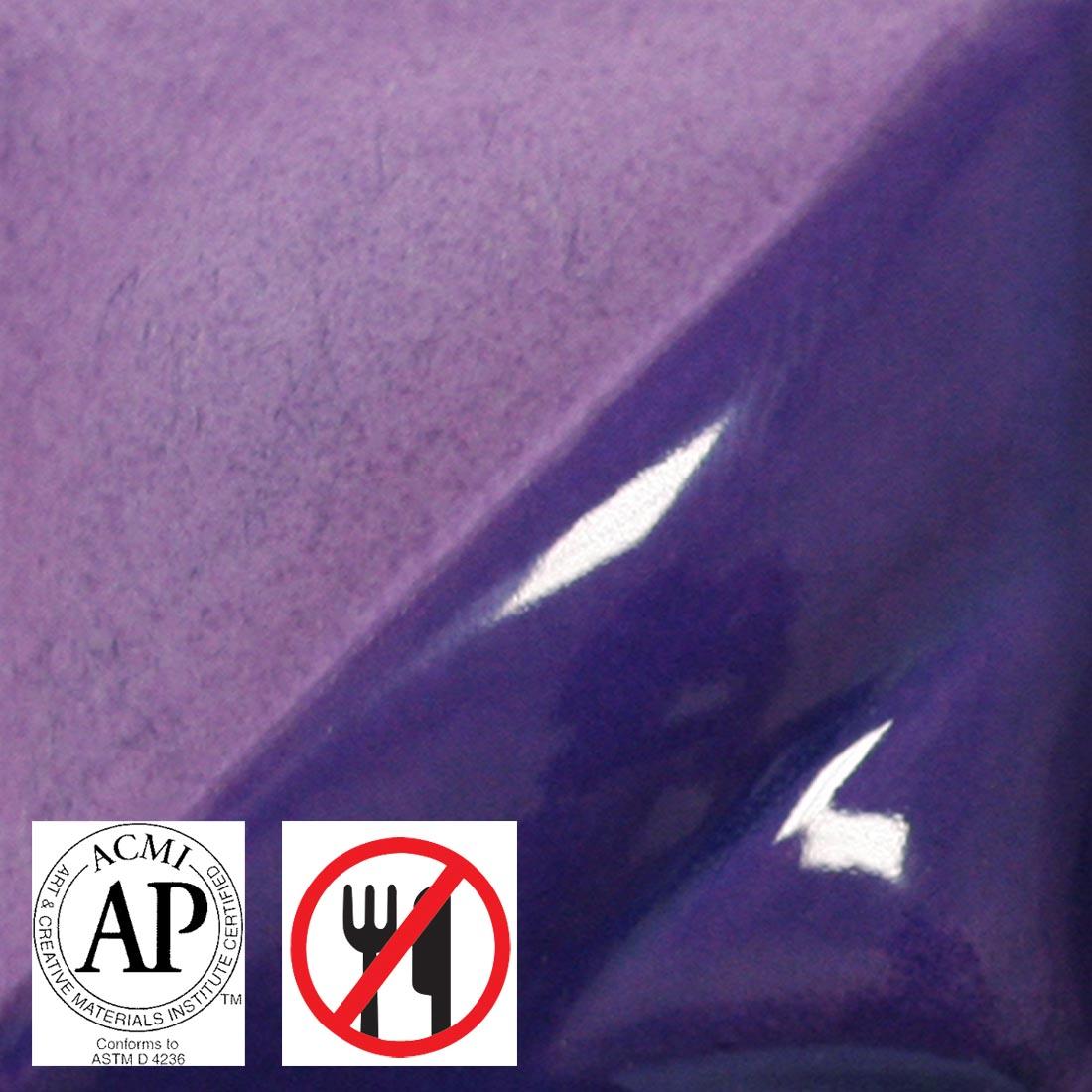 clay tile with amethyst AMACO Velvet Underglaze applied; symbols for AP Seal and not food safe