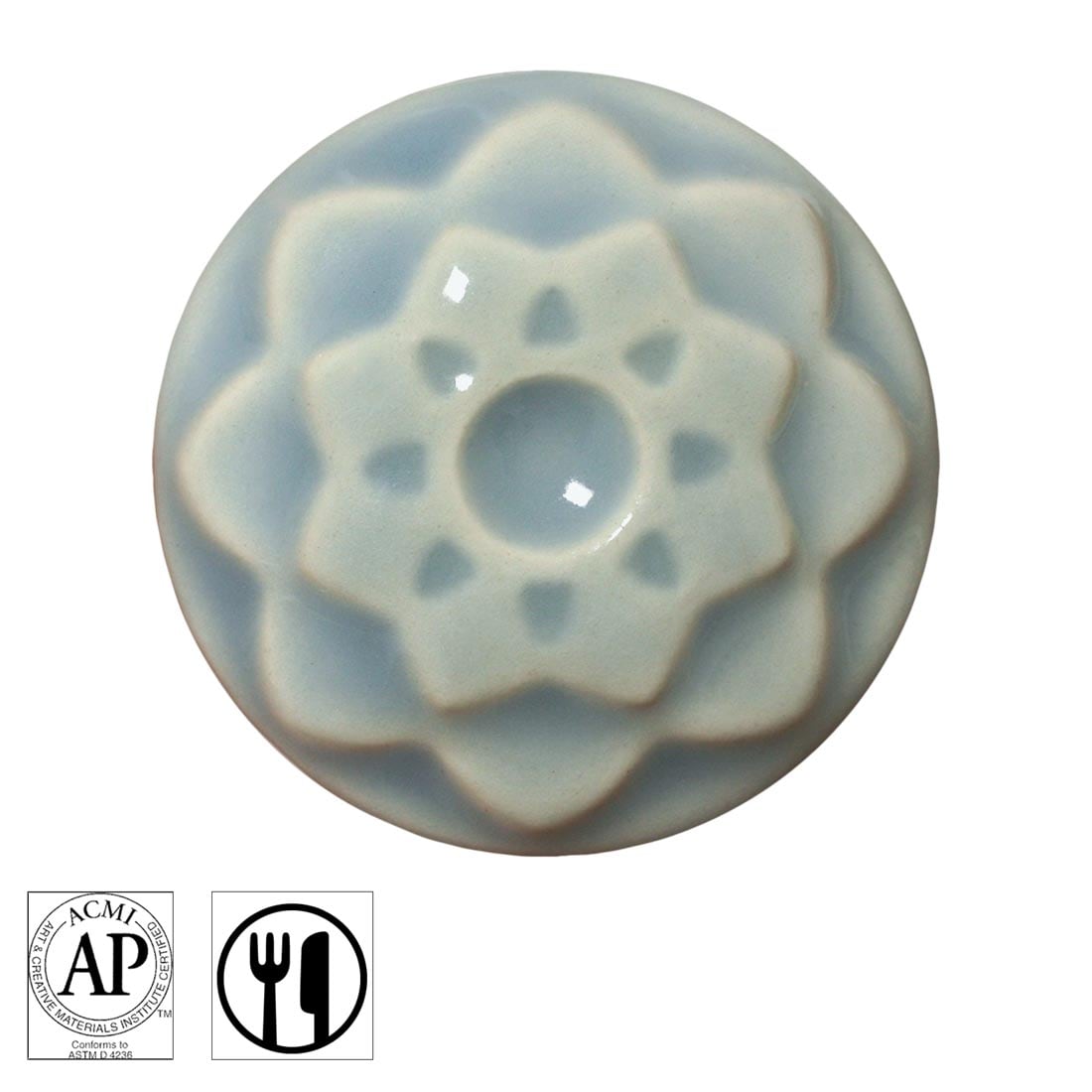 clay chip with Ice AMACO Celadon High Fire Transparent Gloss Glaze applied; symbols for AP Seal and food safe