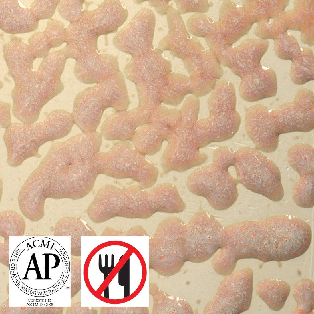 Clay tile with Flux Crawl AMACO Crawls High Fire Glaze applied plus symbols for AP Seal and not food safe