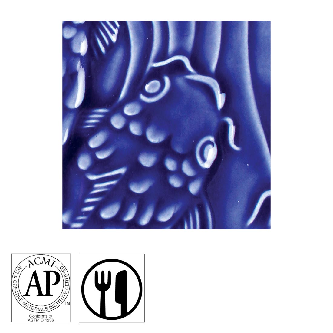 clay tile with Dark Blue AMACO Gloss Glaze applied; symbols for AP Seal and food safe