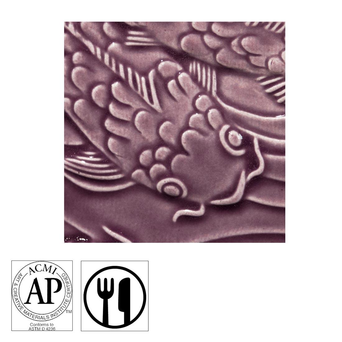 clay tile with Mulberry Red AMACO Gloss Glaze applied; symbols for AP Seal and food safe