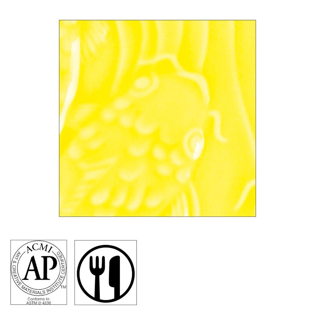 clay tile with Canary Yellow AMACO Gloss Glaze applied; symbols for AP Seal and food safe