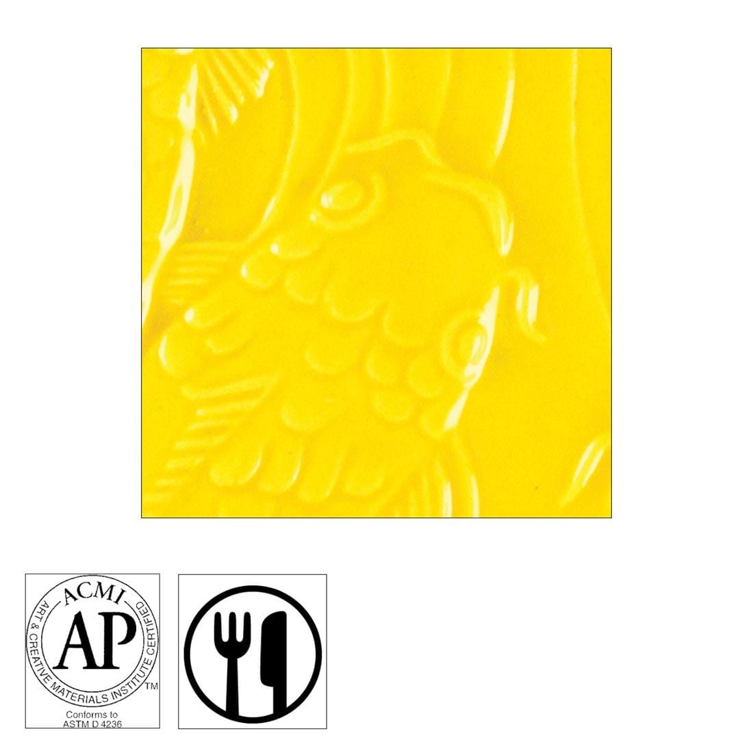 clay tile with Brilliant Yellow AMACO Gloss Glaze applied; symbols for AP Seal and food safe