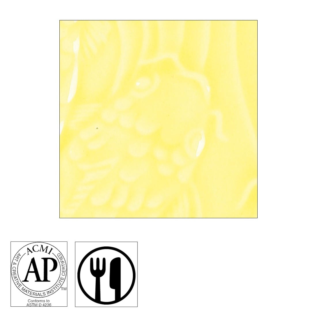 clay tile with Pale Yellow AMACO Gloss Glaze applied; symbols for AP Seal and food safe