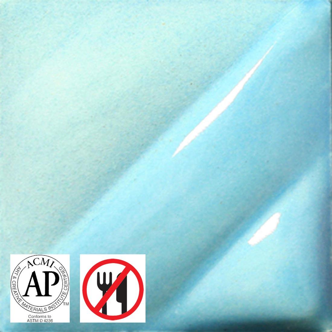 clay tile with Light Blue AMACO Liquid Underglaze Decorating Color applied; symbols for AP Seal and not food safe