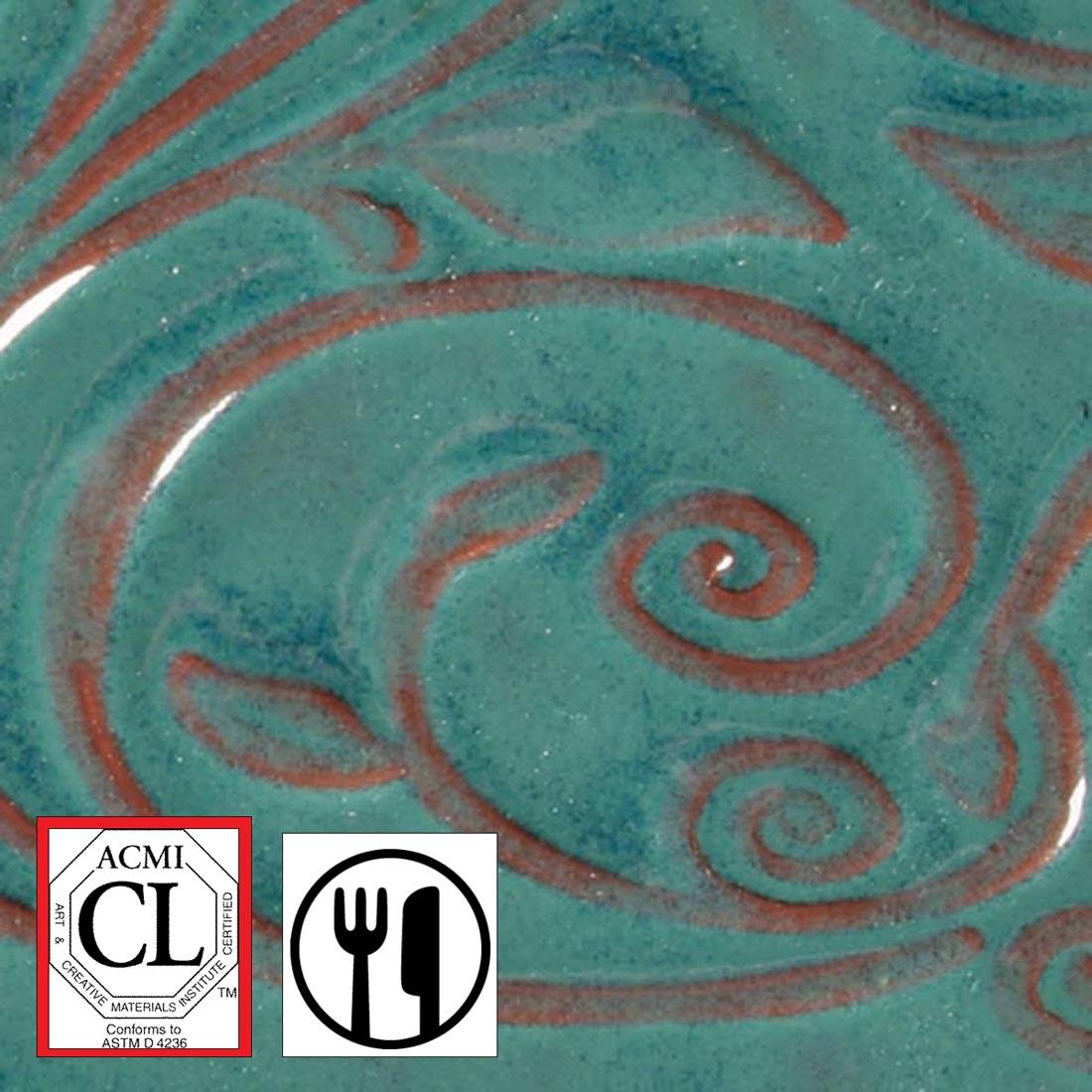clay tile with Turquoise AMACO Opalescent Glaze applied; symbols for Cautionary Label and food safe