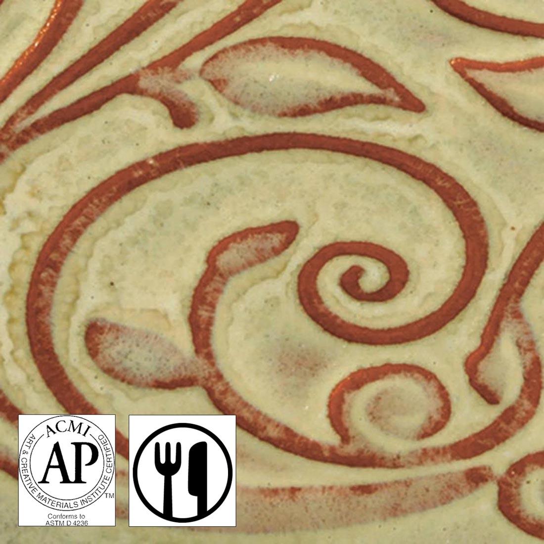 clay tile with Autumn Leaf AMACO Opalescent Glaze applied; symbols for AP Seal and food safe