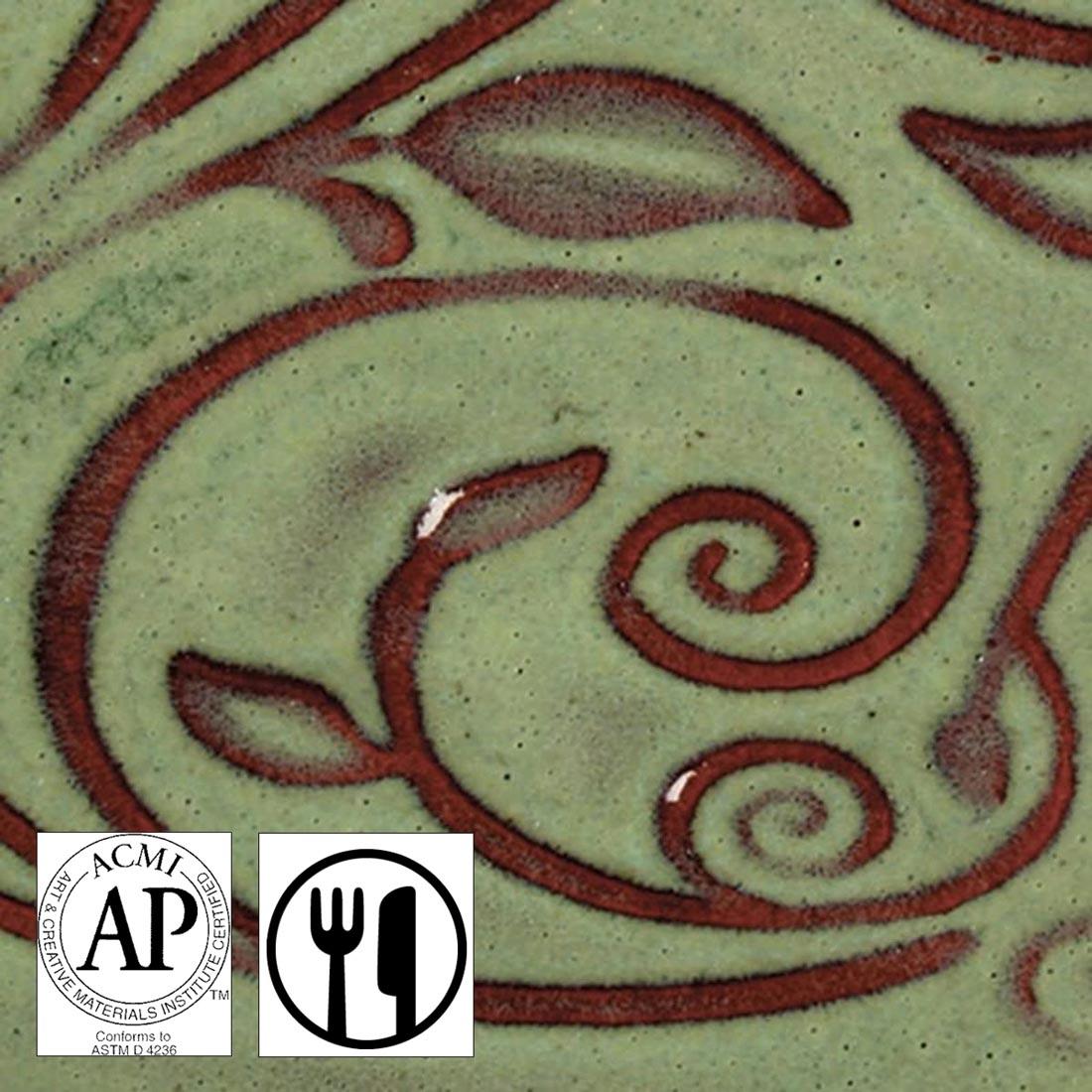 clay tile with Moss Green AMACO Opalescent Glaze applied; symbols for AP Seal and food safe