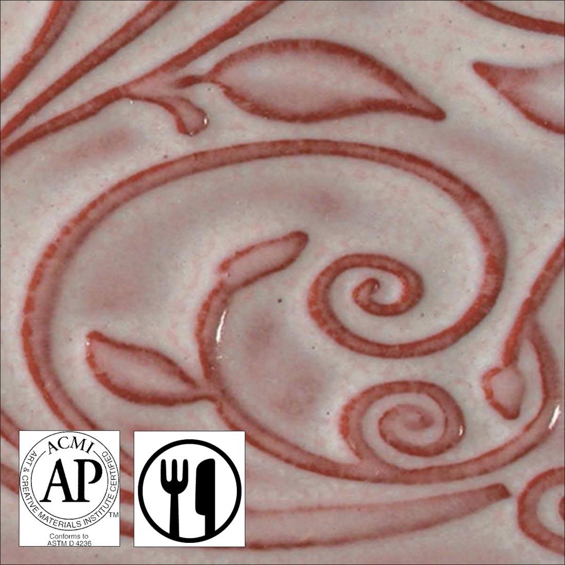 clay tile with Dusty Rose AMACO Opalescent Glaze applied; symbols for AP Seal and food safe
