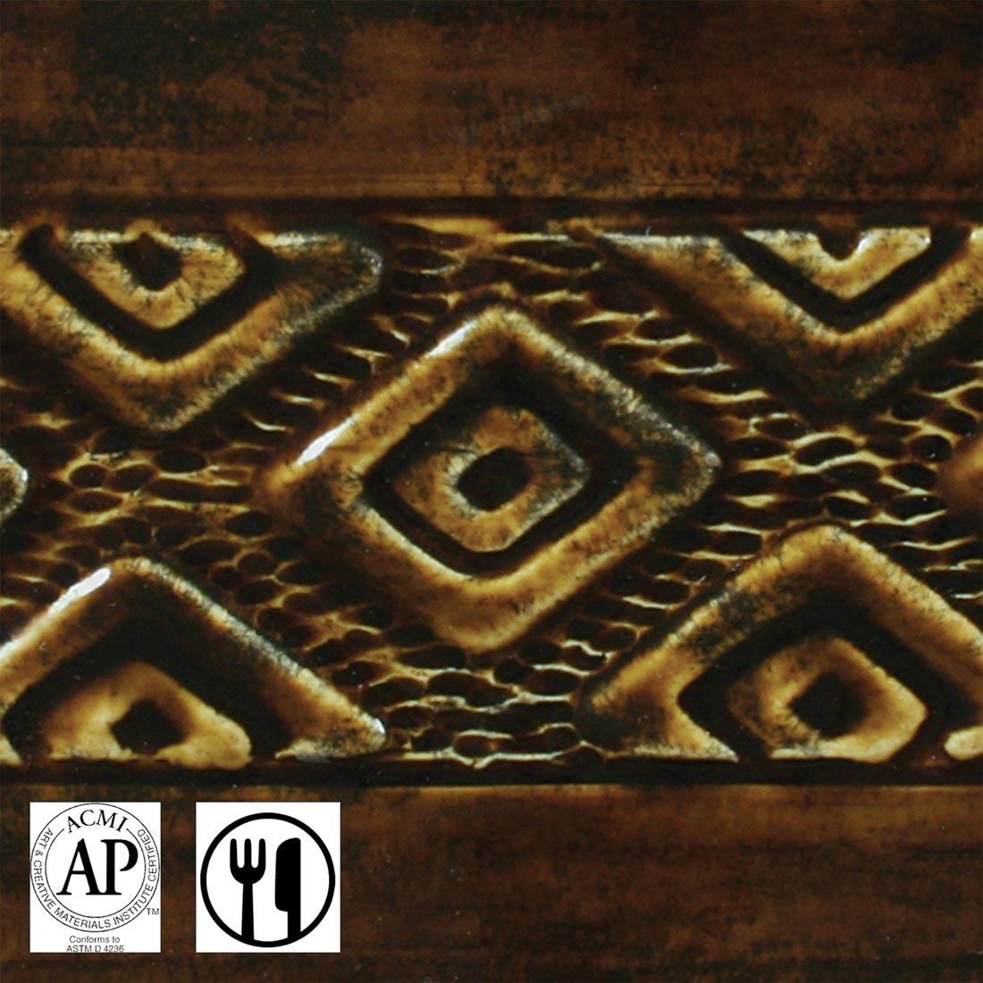 clay tile with Textured Amber Brown AMACO Potter's Choice High Fire Glaze applied; symbols for AP Seal and food safe