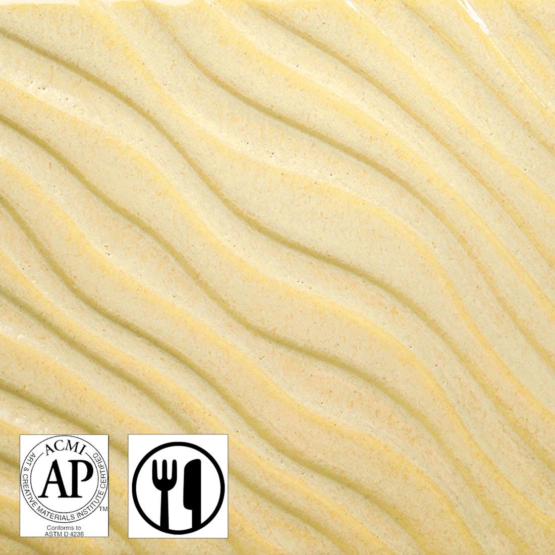 Clay tile with Sunbeam AMACO Potter's Choice Flux High Fire Glaze applied plus symbols for AP Seal and Food Safe