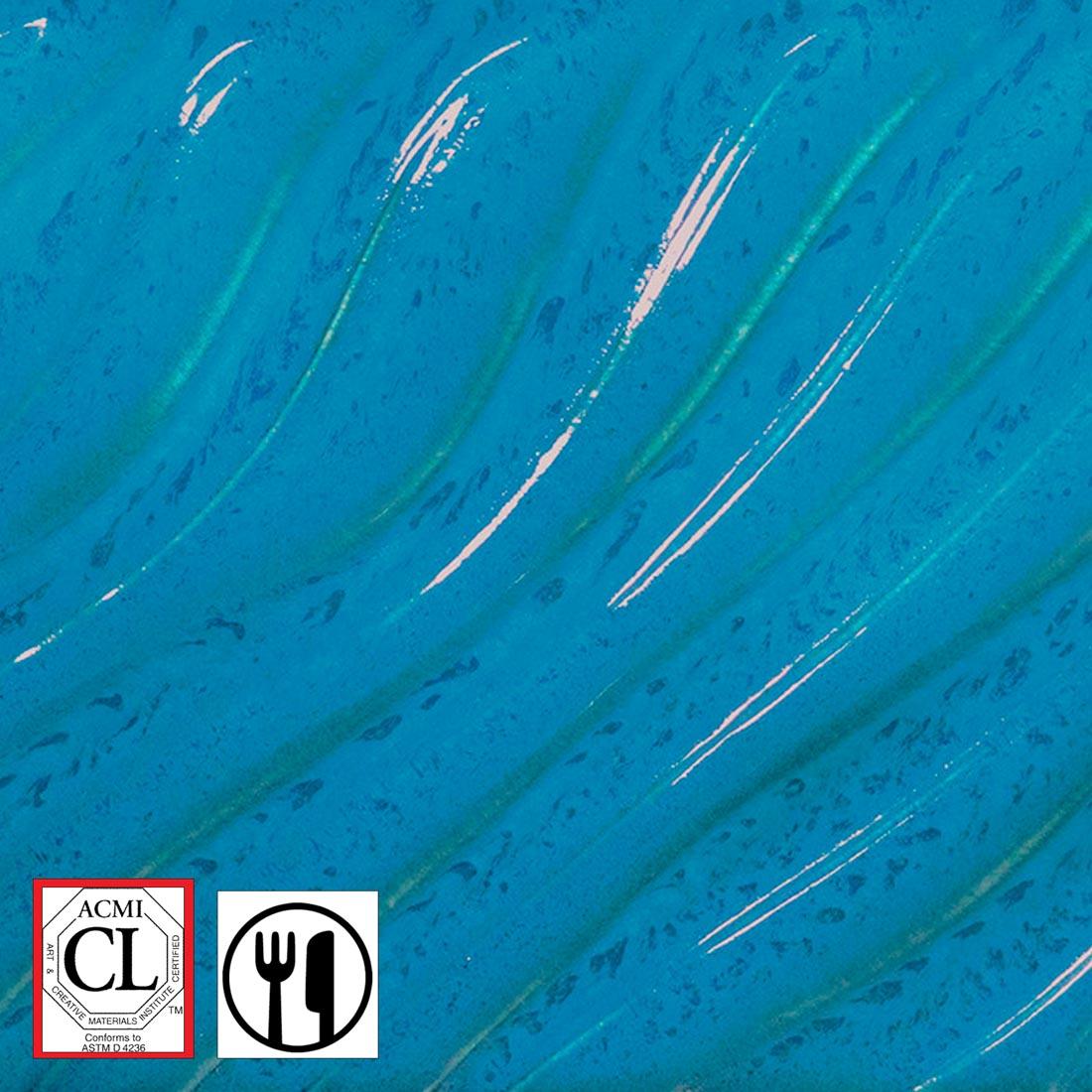 Clay tile with Night Rain AMACO Phase High Fire Glaze applied plus symbols for Cautionary Label and Food Safe