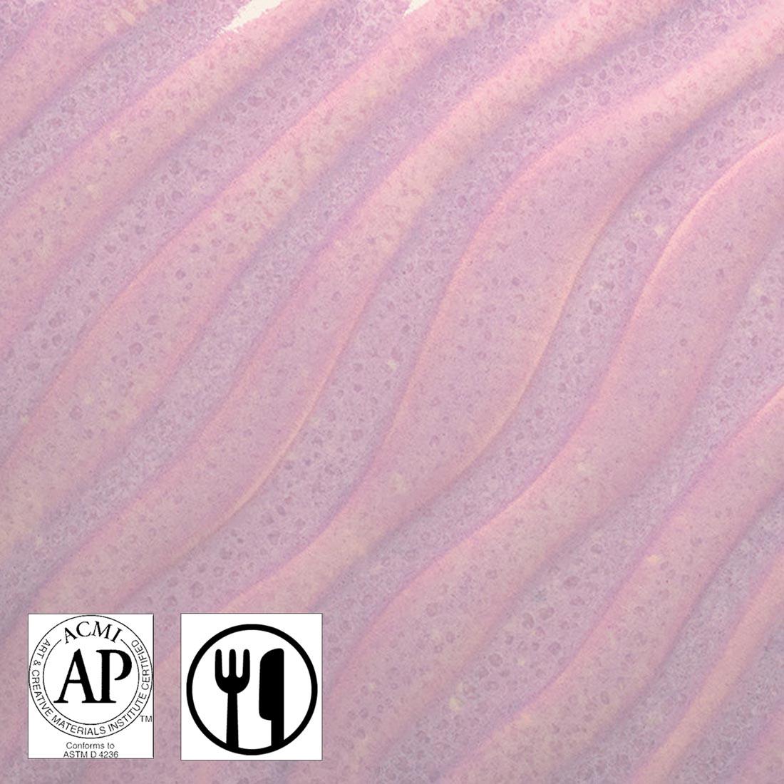 Clay tile with Lunar Pink AMACO Phase High Fire Glaze applied plus symbols for AP Seal and Food Safe