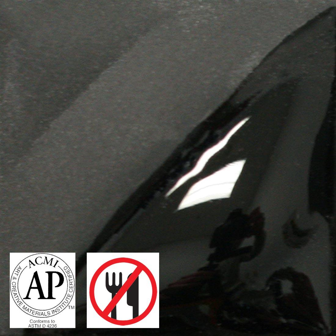 clay tile with Velour Black AMACO Velvet Underglaze applied; symbols for AP Seal and not food safe