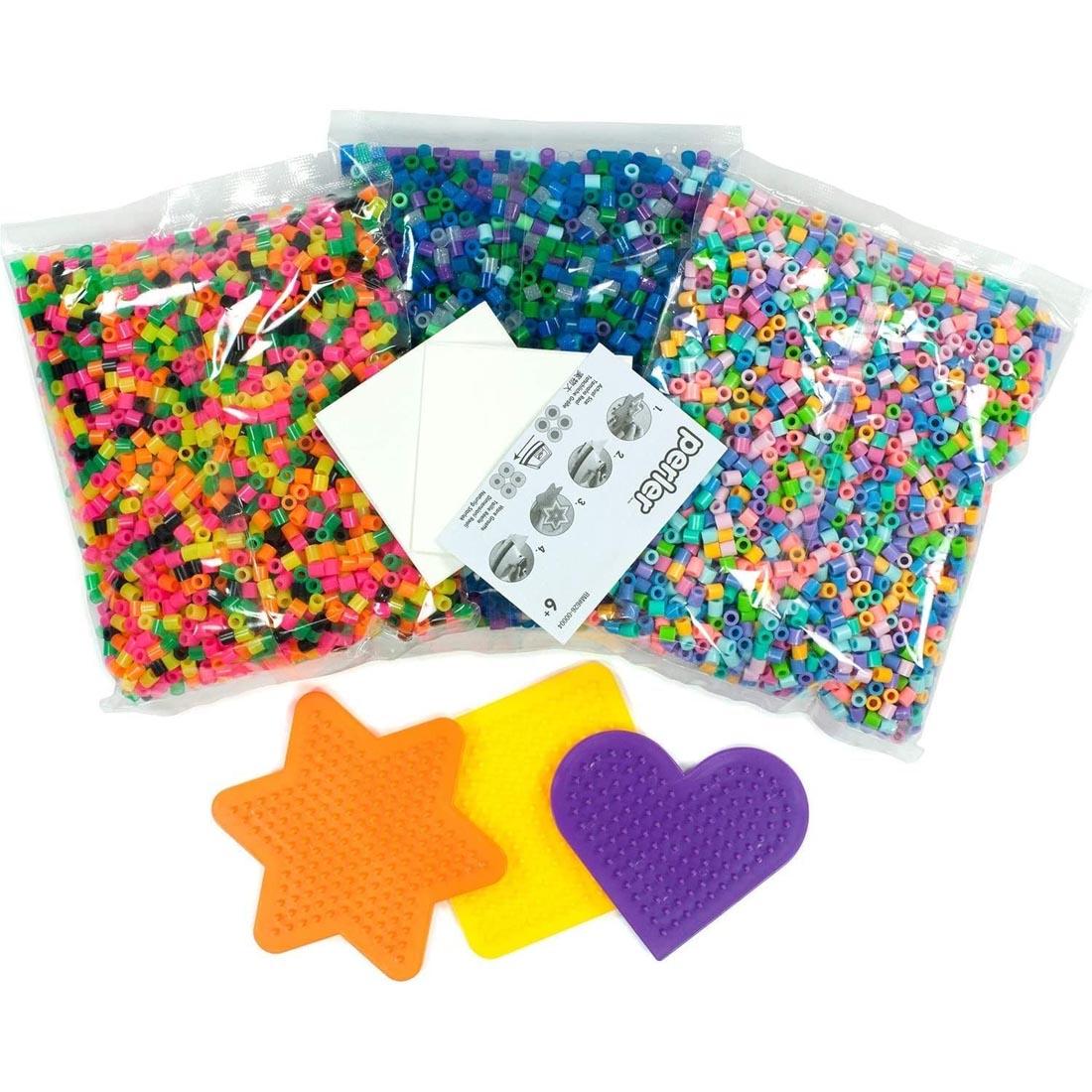 contents of Perler Beads Bead Mania Bucket, including 3 bags of perler beads and 3 pegboards