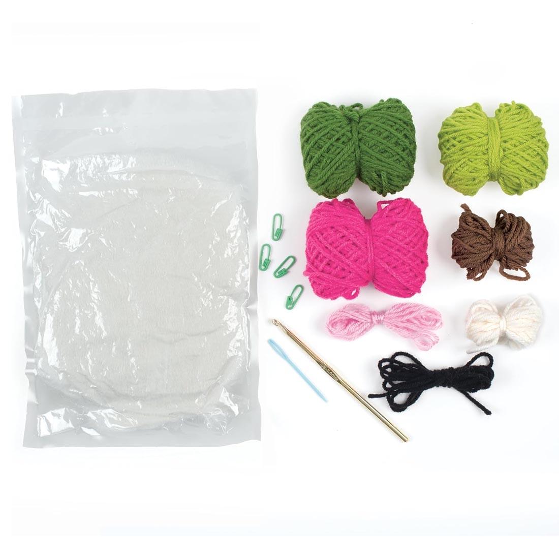 contents of the Learn To Crochet Avocado and Strawberry Kit