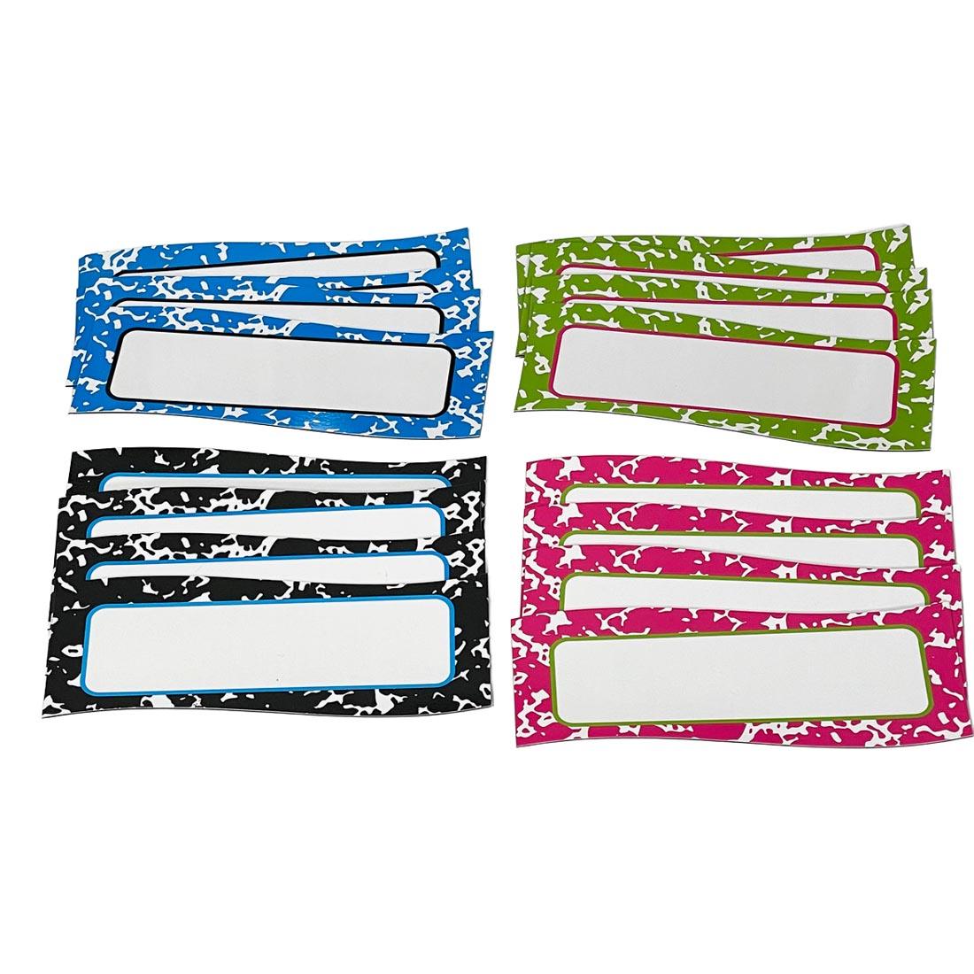 4 piles of Composition Magnetic Nameplates By Ashley