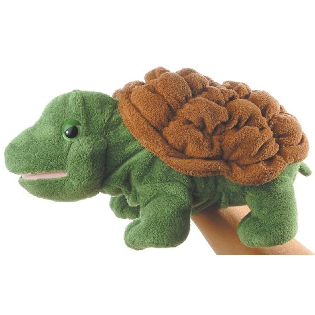 green and brown turtle body puppet