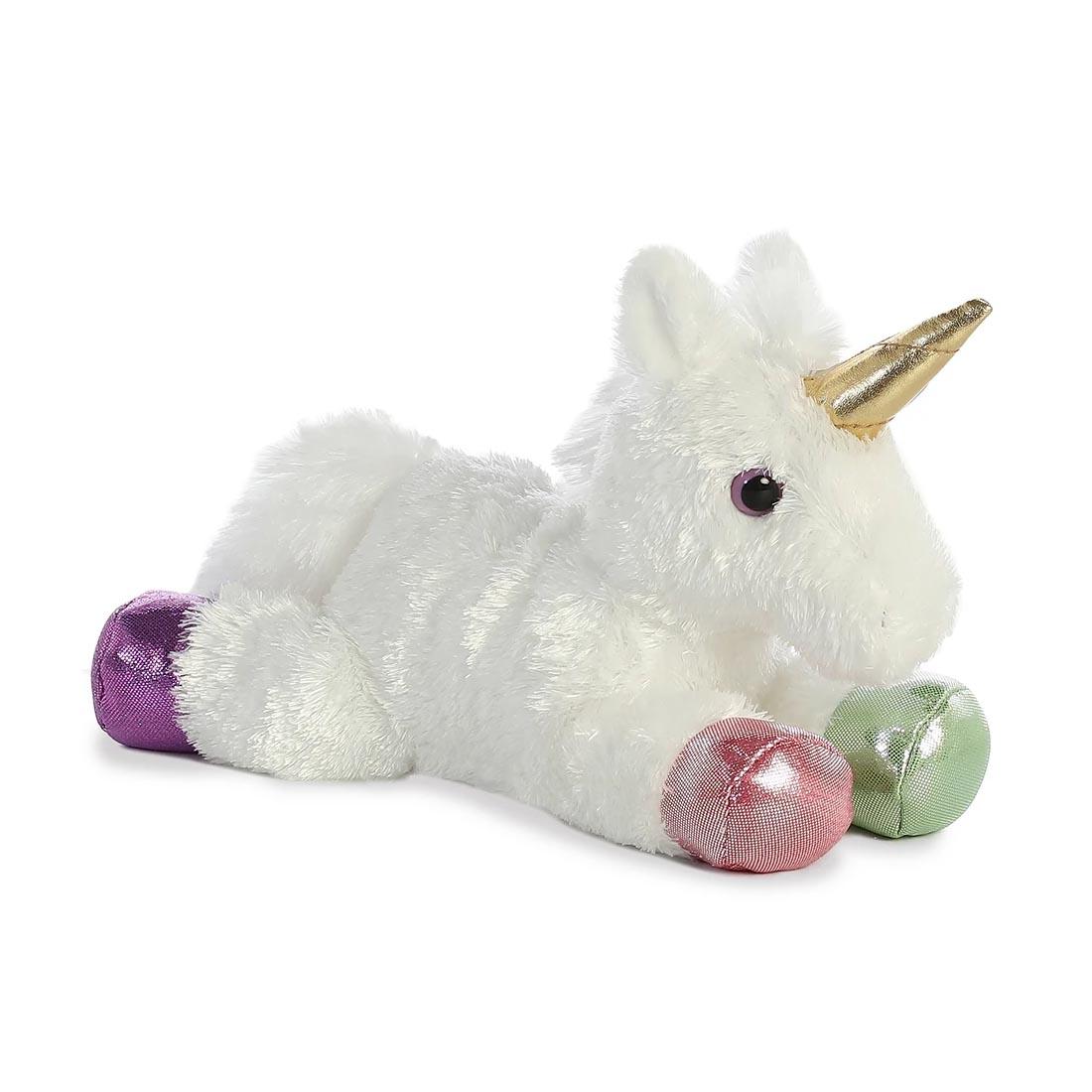 white unicorn stuffed animal with shiny colored hooves and horn
