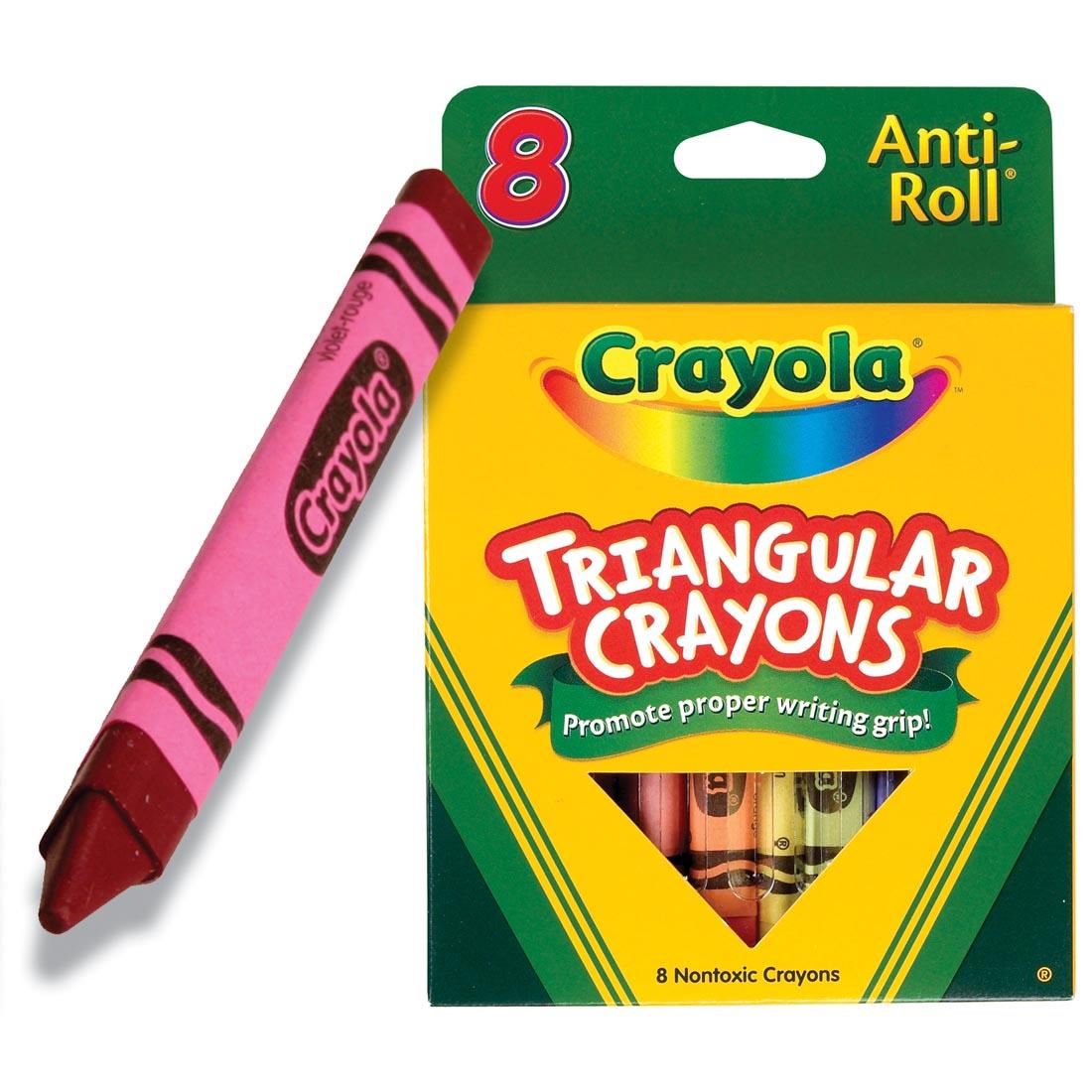 Red Anti-Roll Crayon beside the package of Crayola Triangular Crayons 8-Color Set
