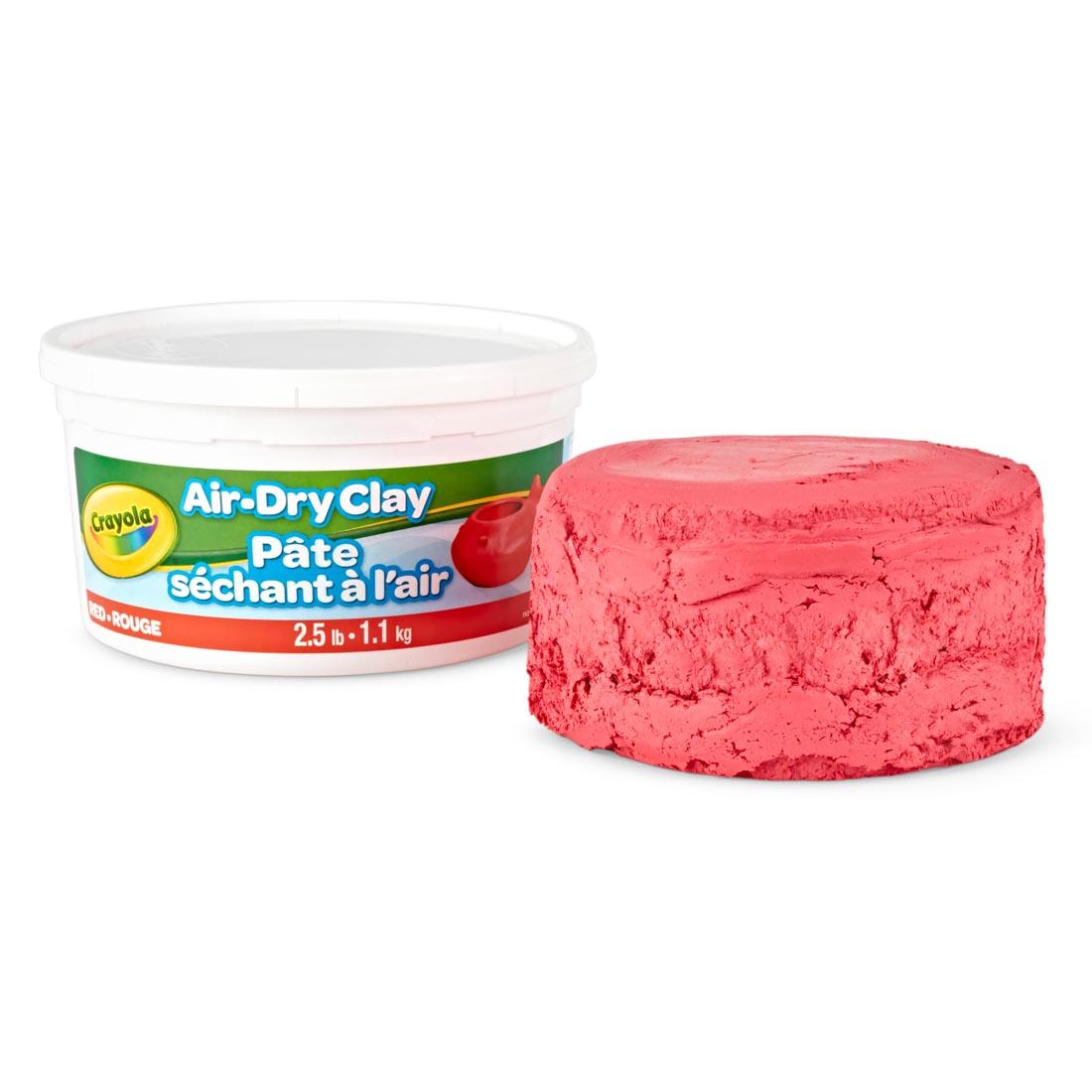 Lump of Red Crayola Air-Dry Clay beside its container