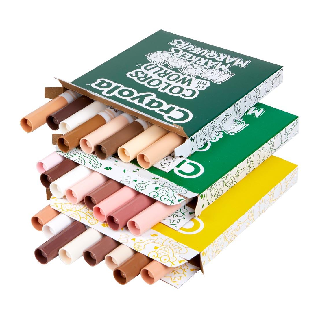 Three opened 8-count boxes of markers, stacked on top of each other and laying down, showing one each of the colors found in Crayola Colors Of The World Washable Broad Line Markers Classpack