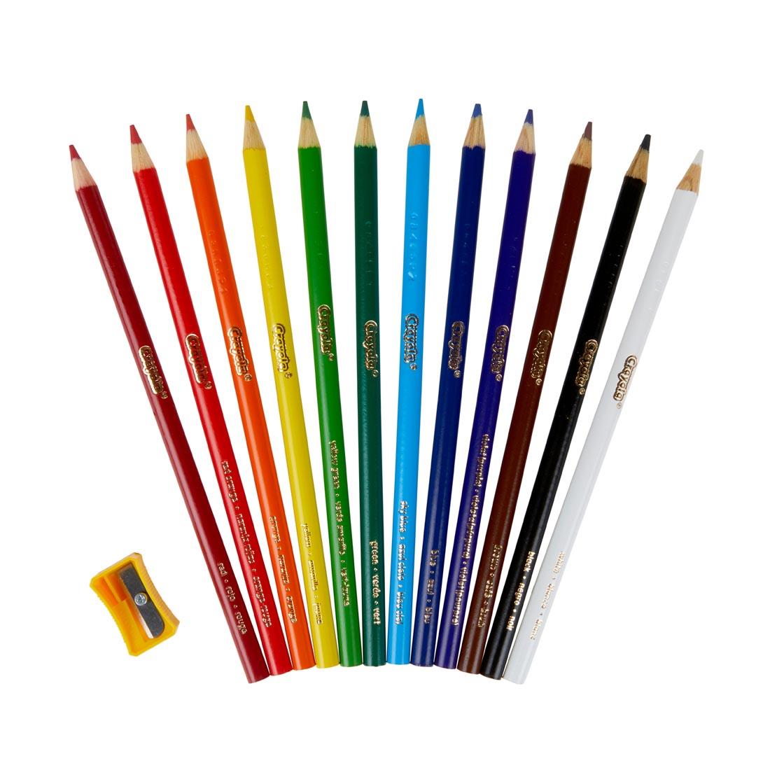 12 colors of Crayola colored pencils, with a pencil sharpener