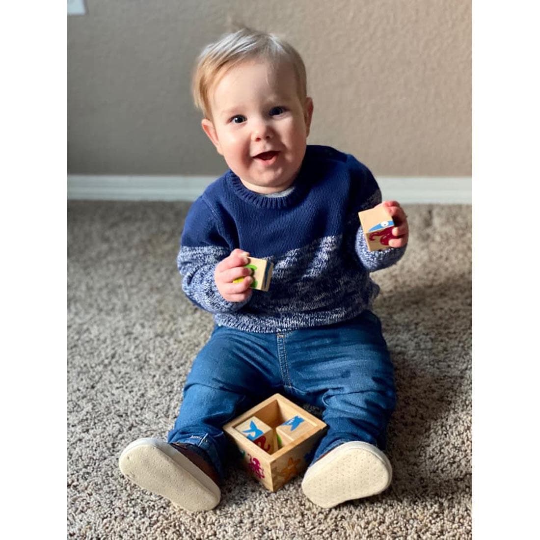 child playing with Sea Life Buddy Blocks by BeginAgain Toys