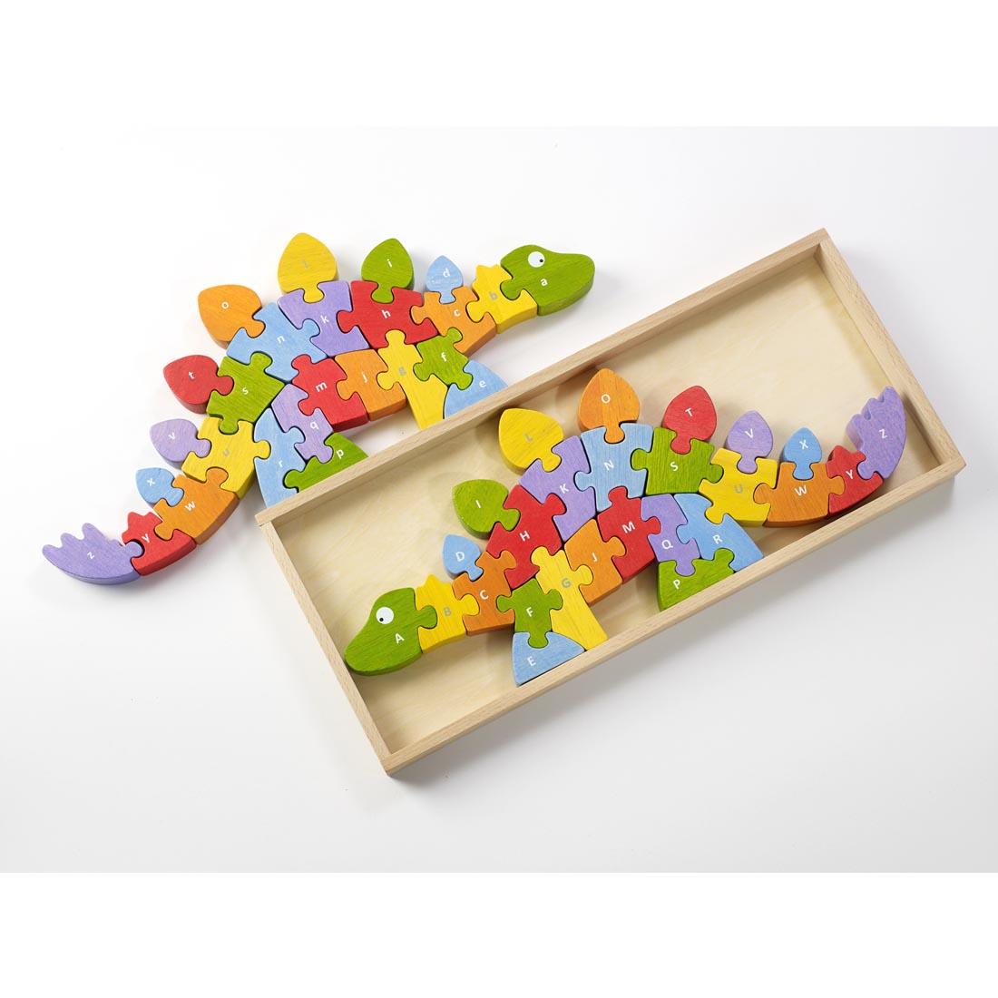 Both lower-case and upper-case sides shown of Dinosaur A To Z Puzzle by BeginAgain Toys