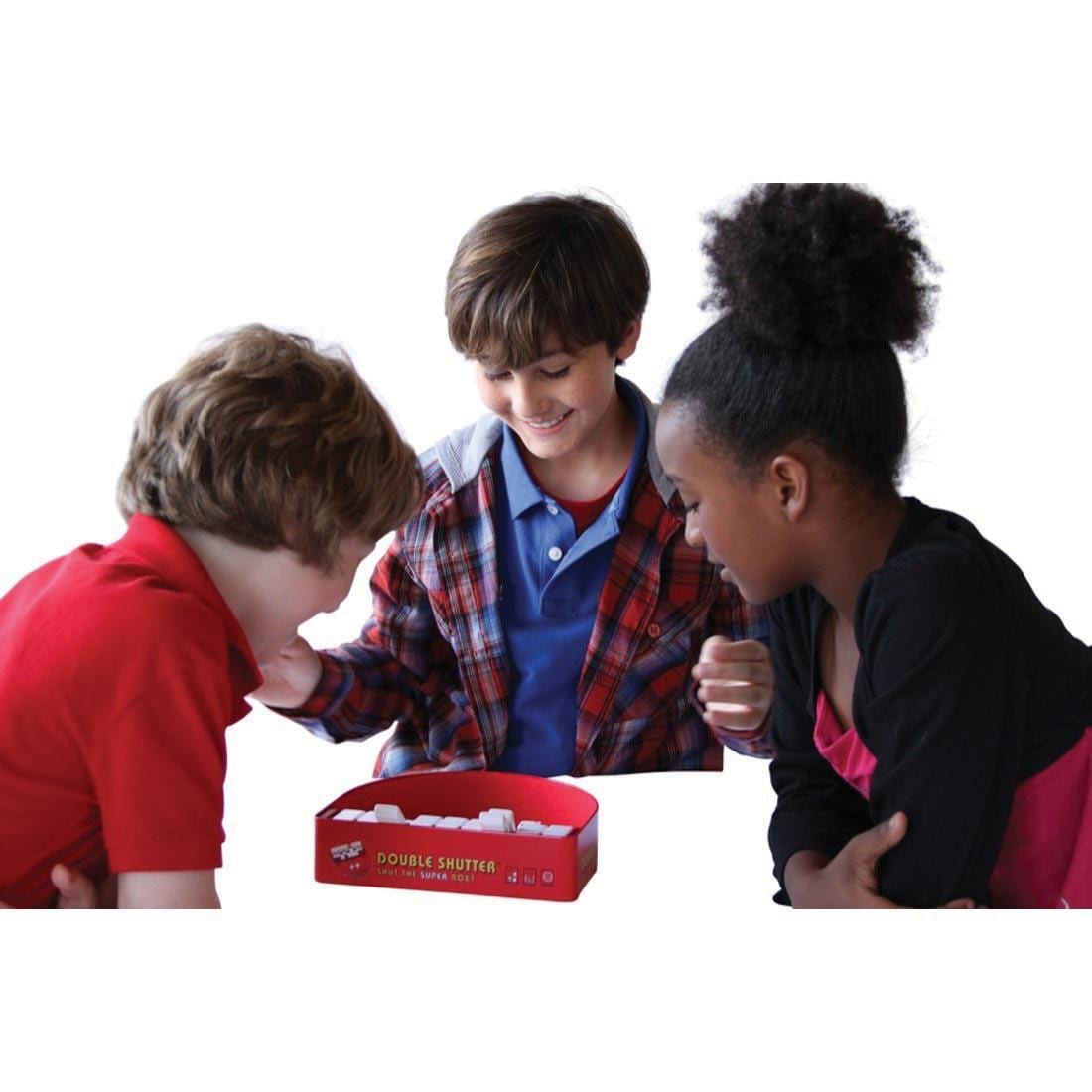 3 kids playing Double Shutter: Shut The Super Box Game