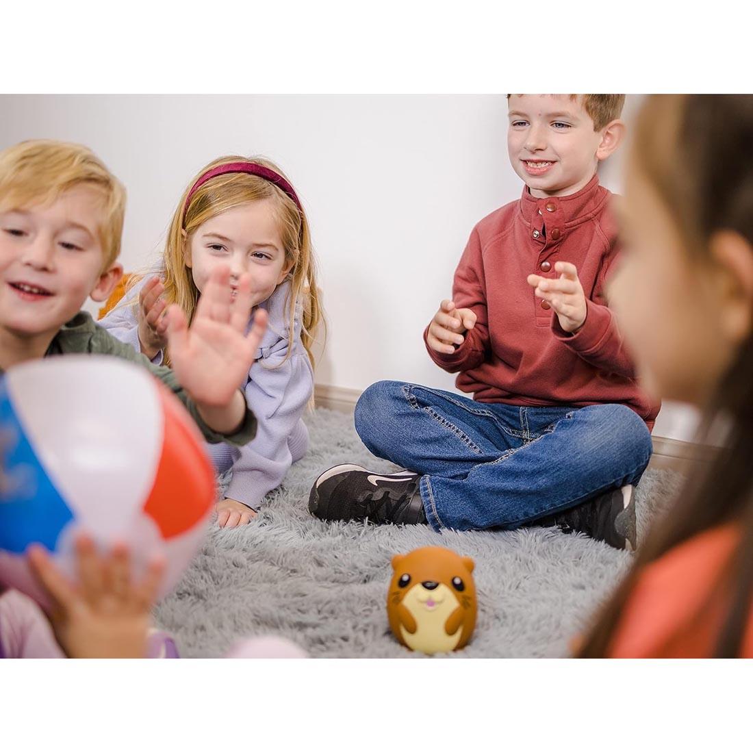 children playing the Pass The Ball With Olie Hot Potato Game