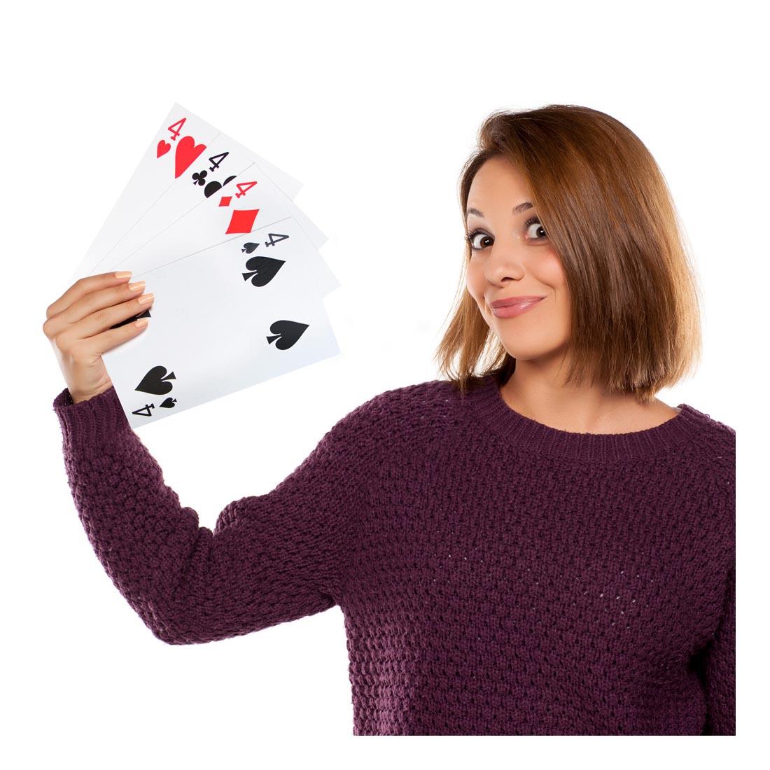 Woman with Four Oversized Playing Cards in her hand