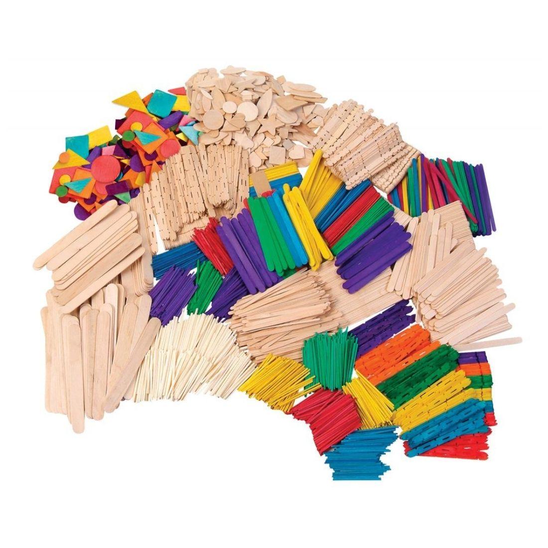 Contents of Creativity Street Wood Crafts Activity Box, showing wooden craft sticks, shapes, colored sticks and more