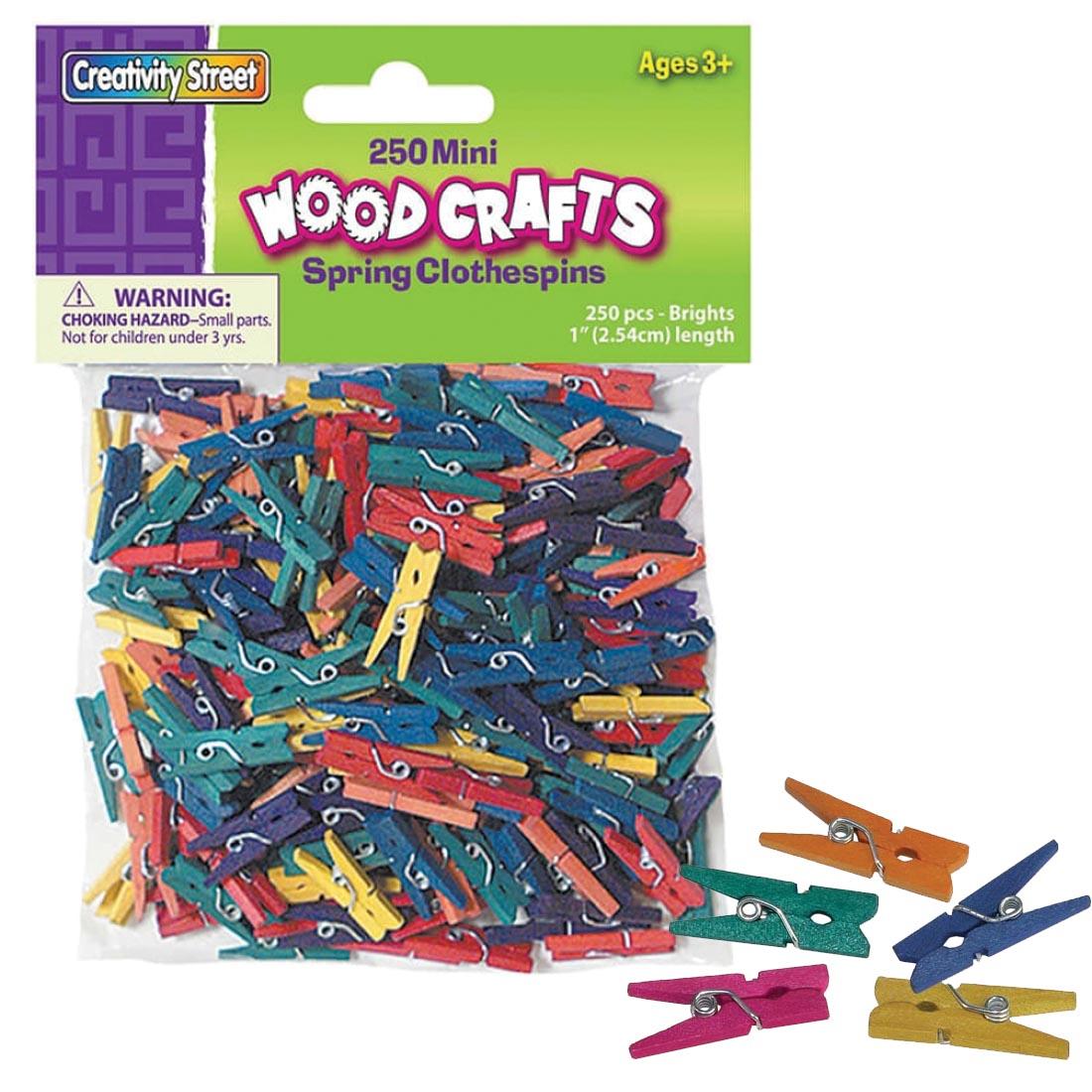 Package of Creativity Street wooden Mini Spring Clothespins in assorted colors