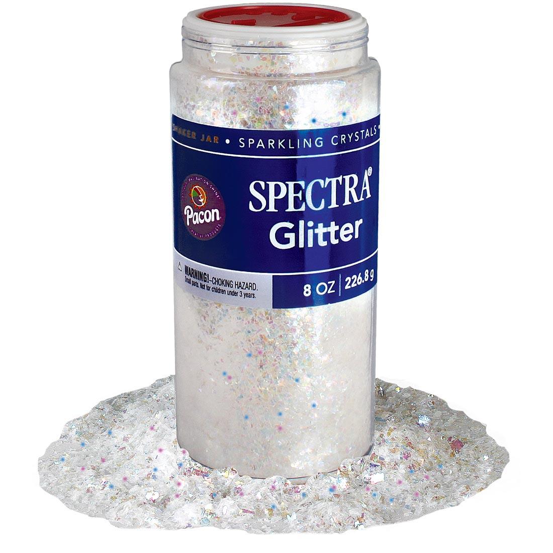 jar of Spectra Random Disco Glitter Flakes sitting in a pile of flakes