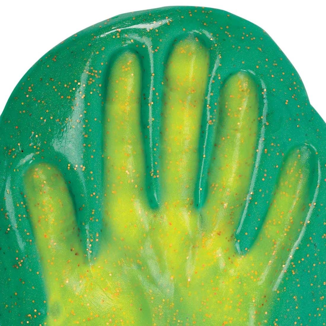 a handprint in Magic Dragon Hypercolor Thinking Putty By Crazy Aaron