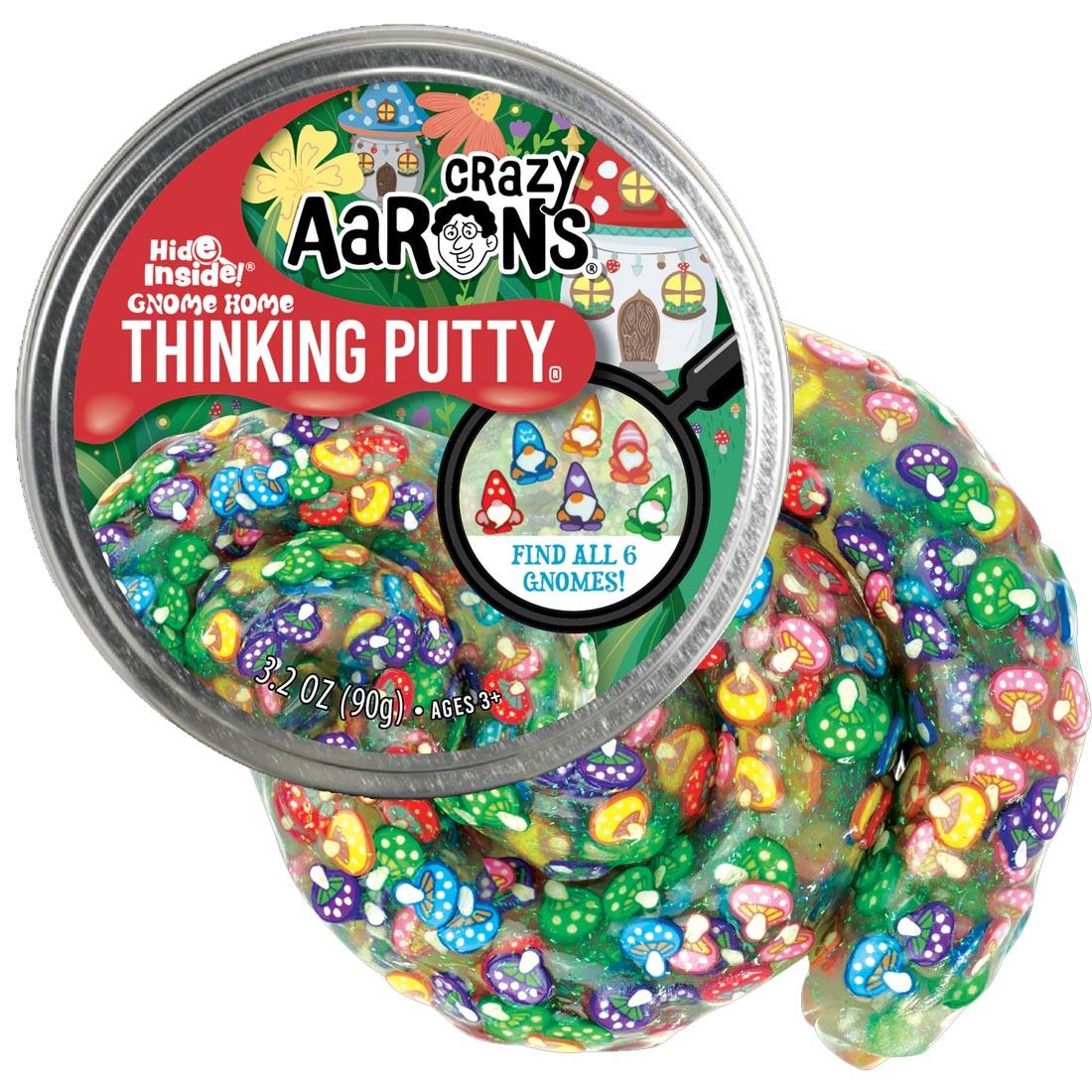 front of tin beside the Gnome Home Thinking Putty by Crazy Aaron