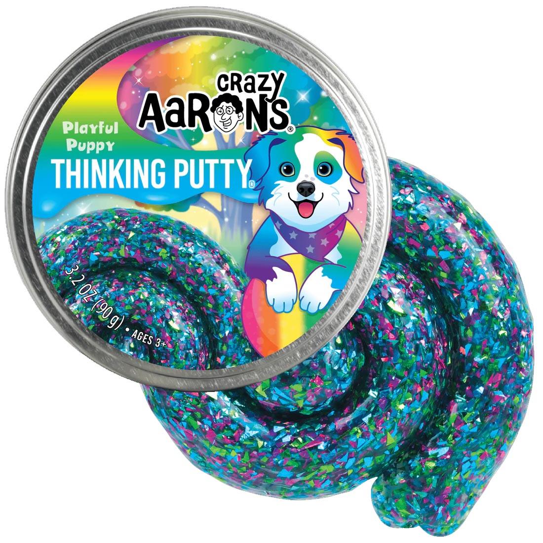 front of tin beside the Playful Puppy Thinking Putty by Crazy Aaron