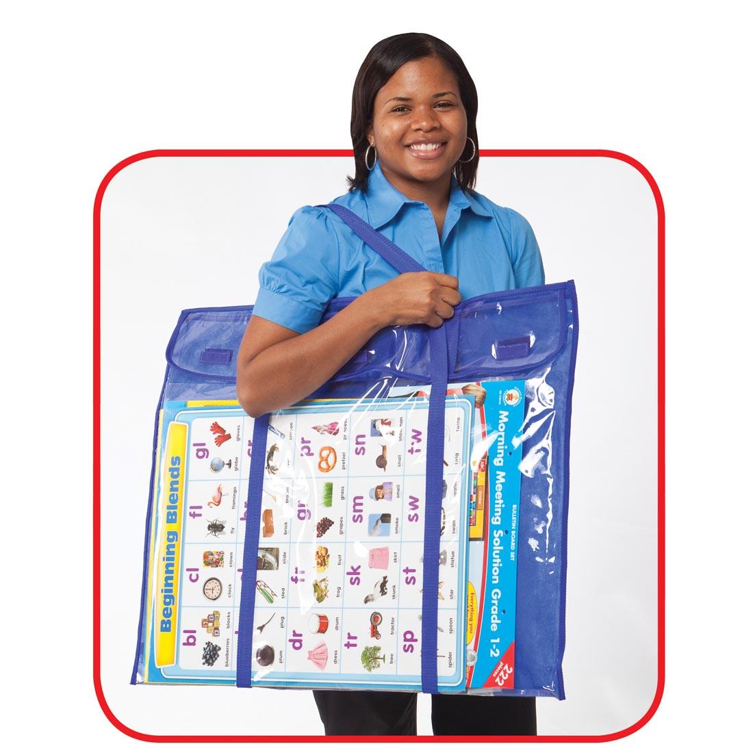 Person Carrying Full Deluxe Bulletin Board Storage Bag by Carson Dellosa