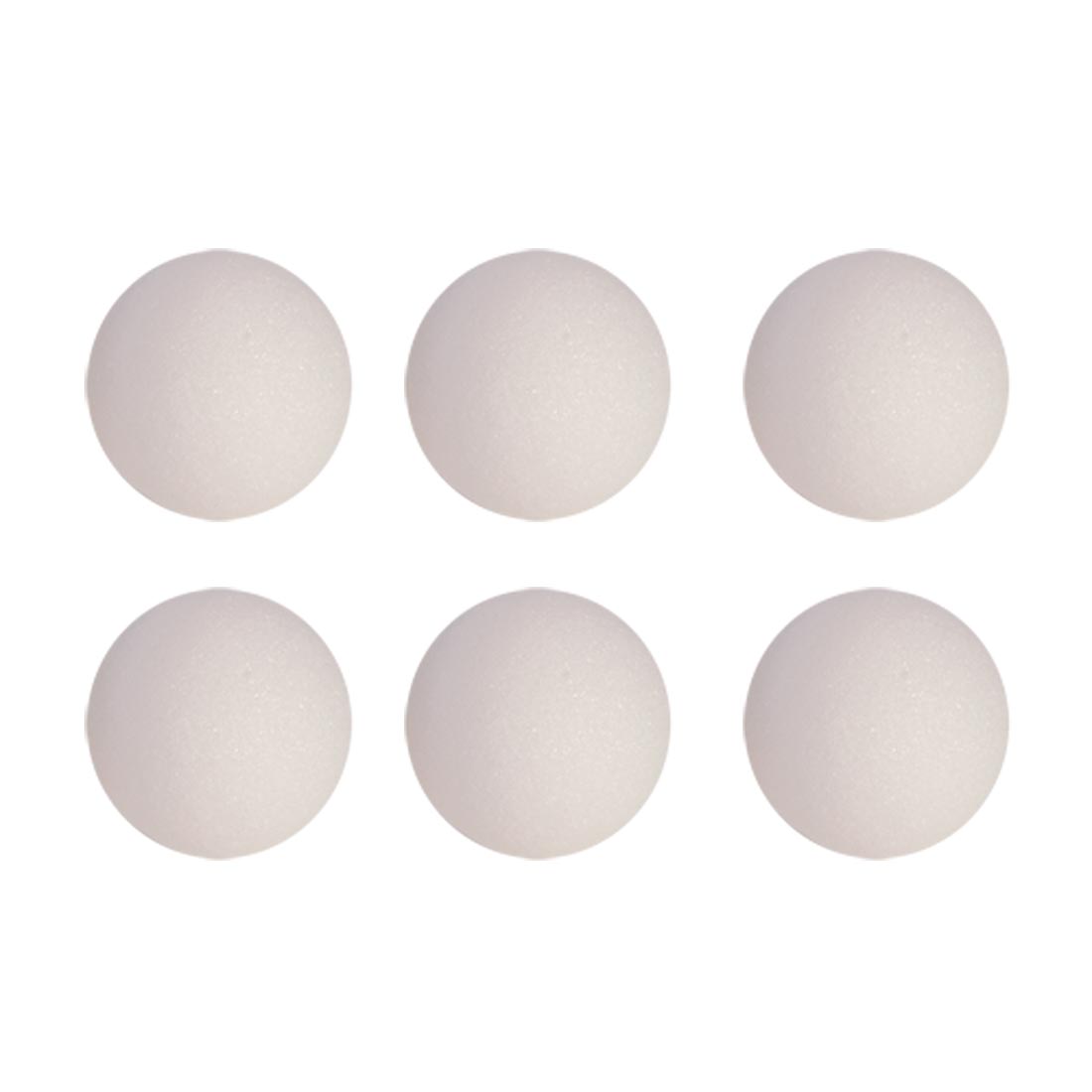 Six White craft foam Balls