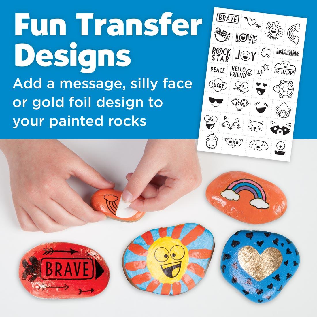 Hands putting image tranfer on painting rocks, with the words: Fun Transfer Designs; Add a message, silly face, or gold foil design to your painted rocks