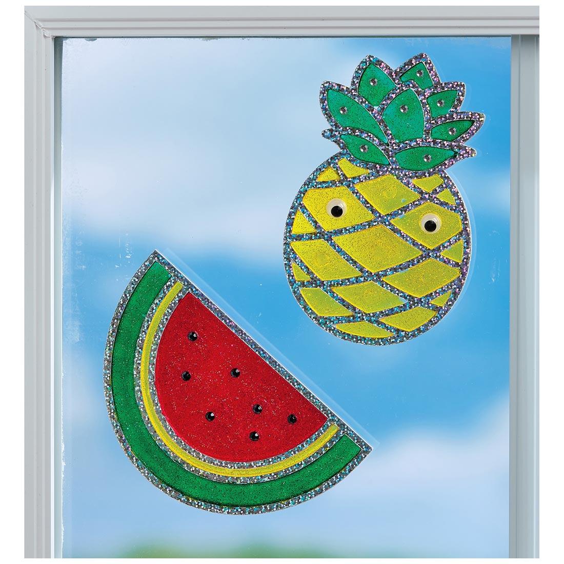 completed Fun Fruit Window Art By Creativity For Kids on a window