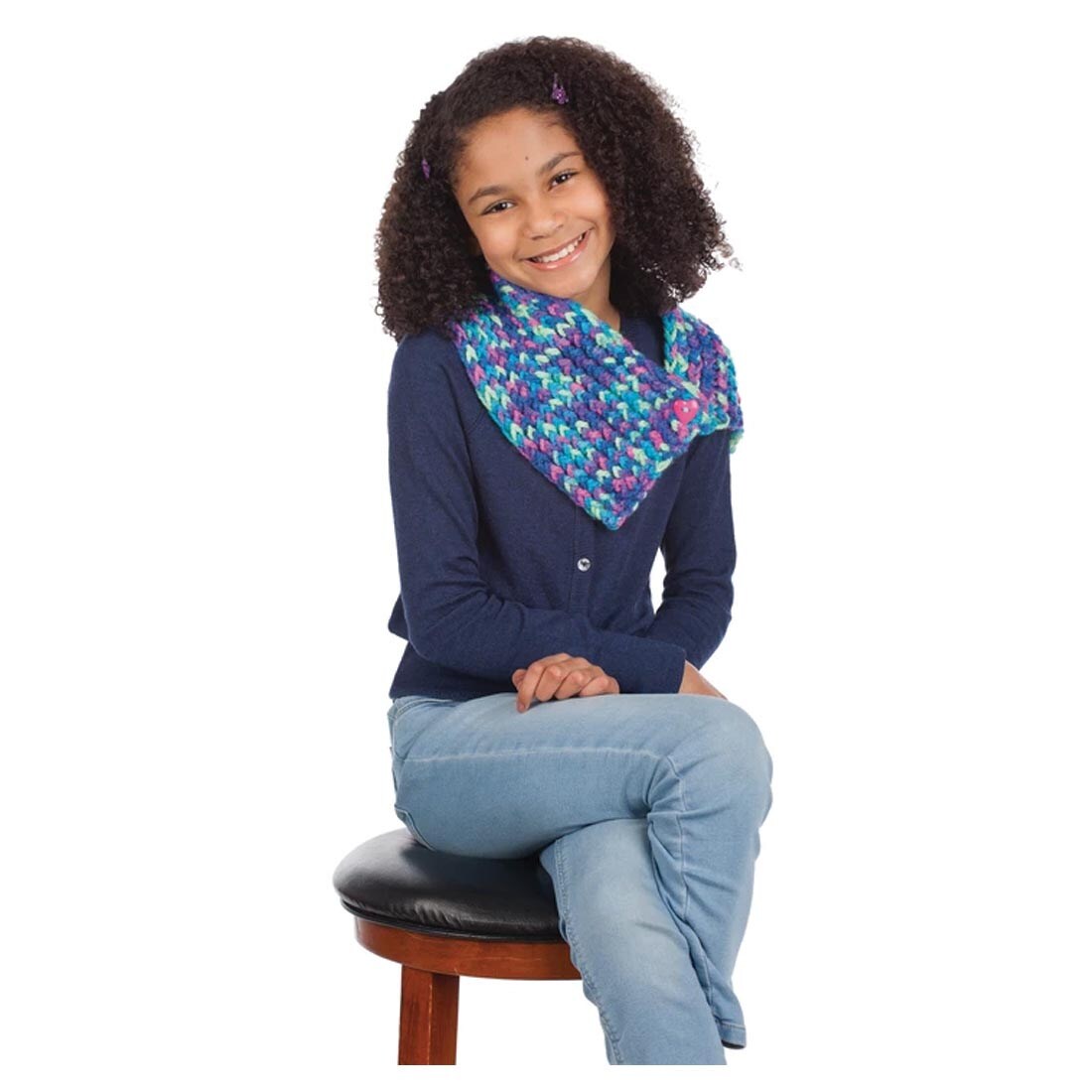 Child wearing completed Quick Knit Button Scarf By Creativity For Kids