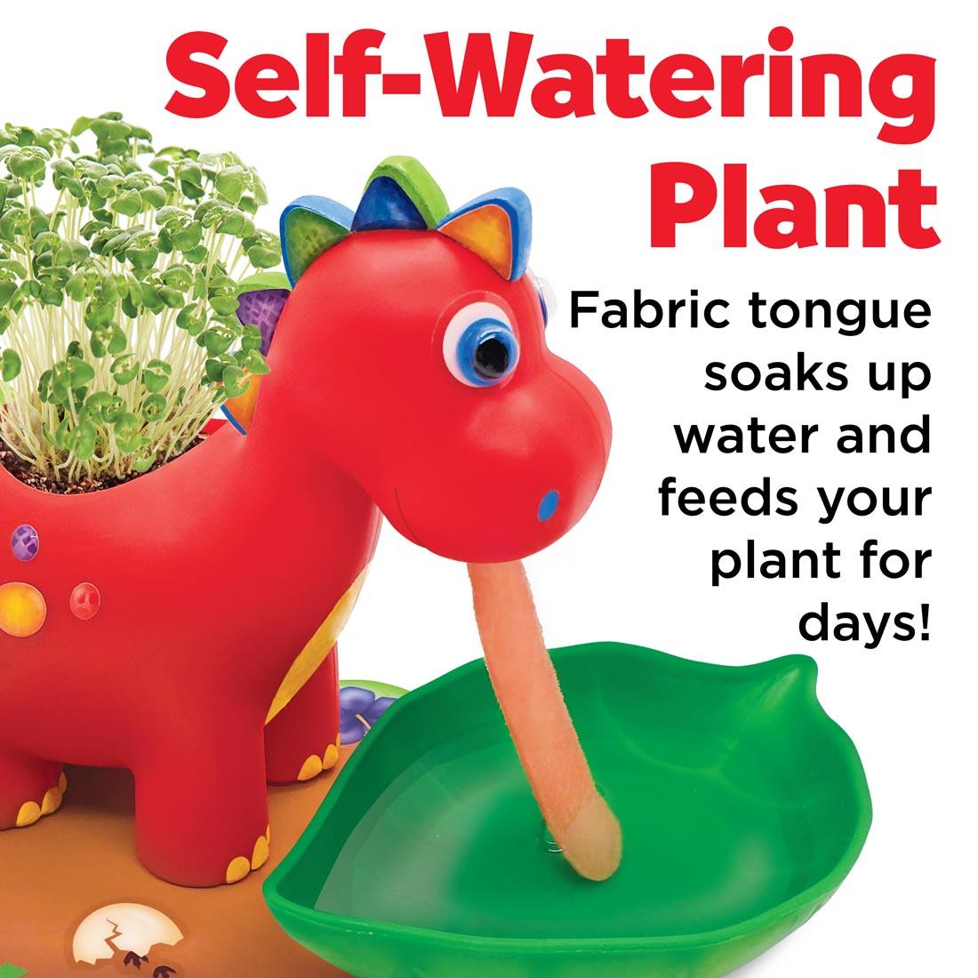 Self-Watering Dinosaur Plant Pet with text Self-Watering Plant. Fabric tongue soaks up water and feeds your plant for days!