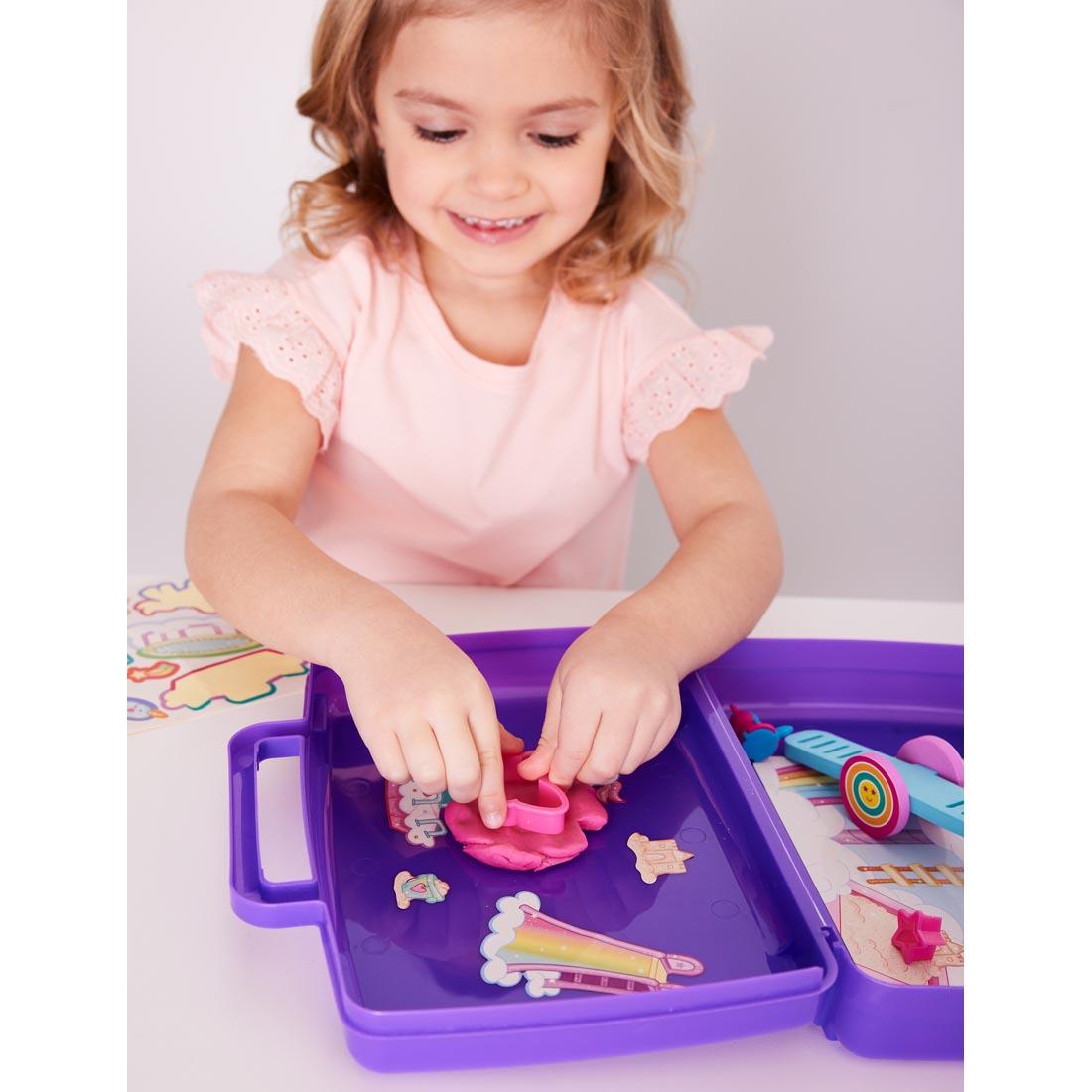 child playing with Sensory On The Go Magical Playground