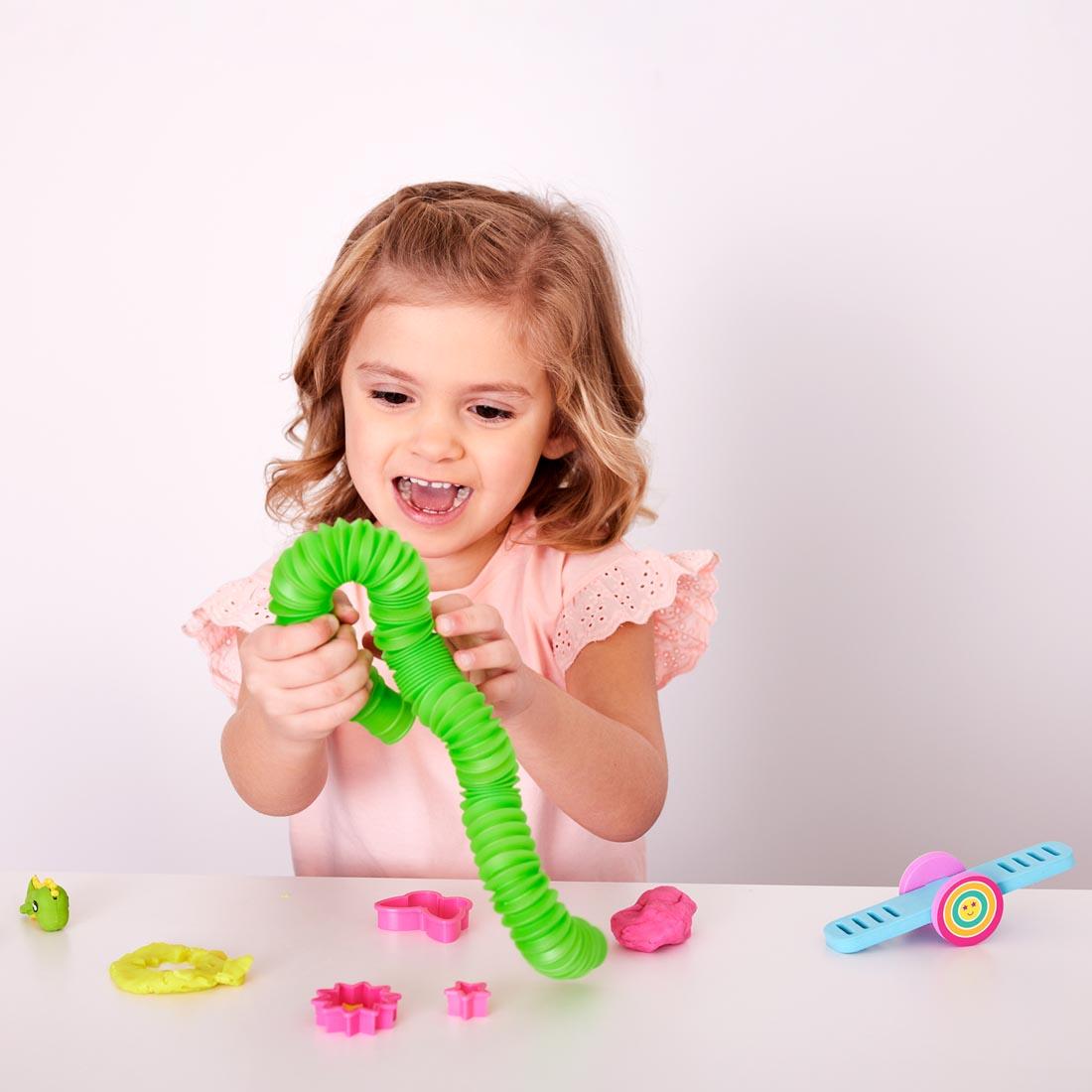 child playing with Sensory On The Go Magical Playground
